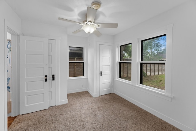 512 Gale St, Houston, TX 77009 - unfurnished bedroom with carpet, baseboards, and a ceiling fan