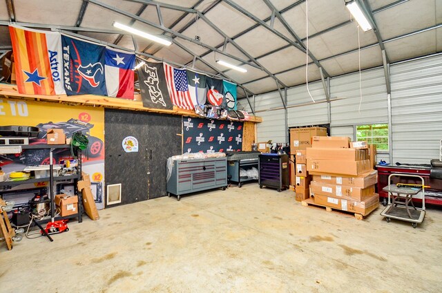 25292 Willow Creek Rd, Hockley, TX 77447 - garage featuring a workshop area