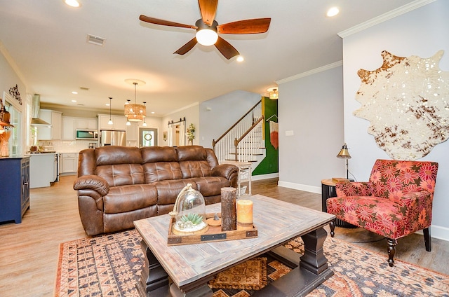 25292 Willow Creek Rd, Hockley, TX 77447 - living room with light wood-style floors, crown molding, a ceiling fan, recessed lighting, and baseboards