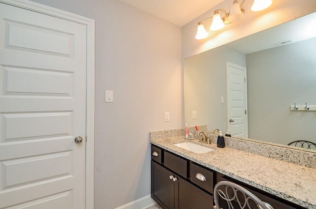 25292 Willow Creek Rd, Hockley, TX 77447 - bathroom featuring vanity and baseboards