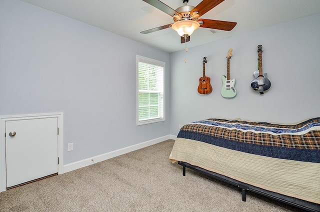25292 Willow Creek Rd, Hockley, TX 77447 - carpeted bedroom with baseboards and a ceiling fan
