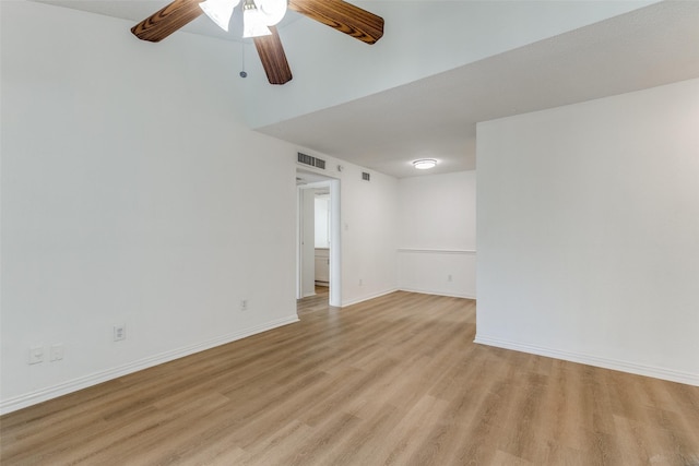 10051 Westpark Dr Unit 274, Houston, TX 77042 - empty room featuring light wood finished floors, ceiling fan, and baseboards