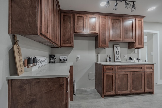 2127 Strawberry Rd, Pasadena, TX 77502 - kitchen featuring light countertops and a sink