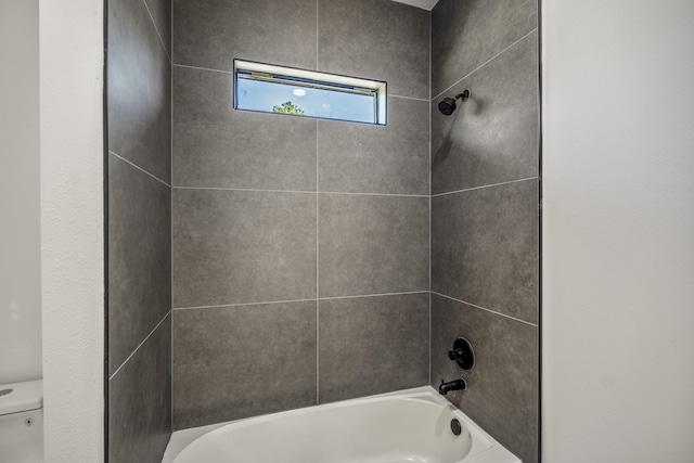 10728 Twin Oak Dr, Conroe, TX 77385 - full bathroom featuring toilet and shower / bathtub combination