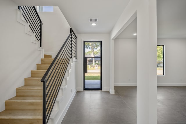 10728 Twin Oak Dr, Conroe, TX 77385 - entryway with stairs, baseboards, and recessed lighting