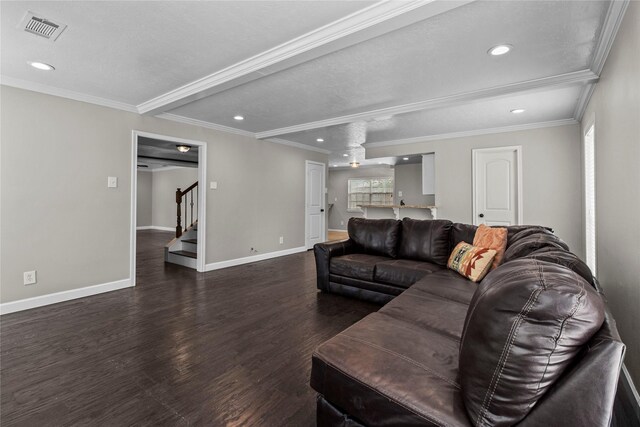 5610 Oakhaven Ln, Houston, TX 77091 - living area with dark wood-style flooring, stairs, recessed lighting, baseboards, and ornamental molding