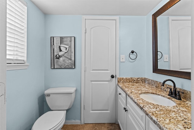 5610 Oakhaven Ln, Houston, TX 77091 - bathroom featuring vanity, toilet, and baseboards