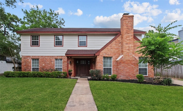 5610 Oakhaven Ln, Houston, TX 77091 - view of front of property featuring a chimney and brick siding