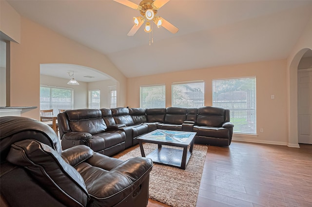 3619 Strartford Arms Ln, Sugar Land, TX 77498 - living room with arched walkways, a ceiling fan, lofted ceiling, and wood finished floors