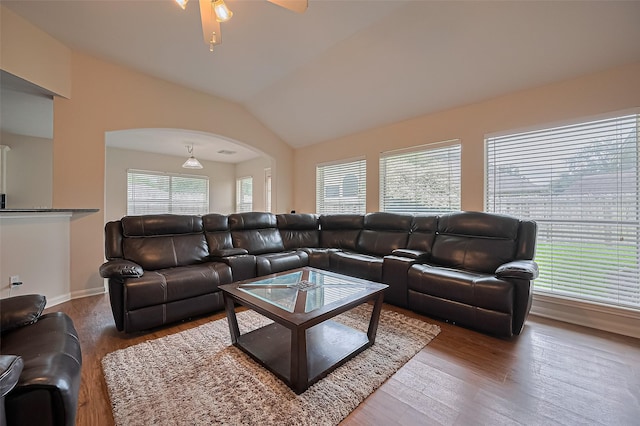 3619 Strartford Arms Ln, Sugar Land, TX 77498 - living area featuring lofted ceiling, arched walkways, wood finished floors, and ceiling fan
