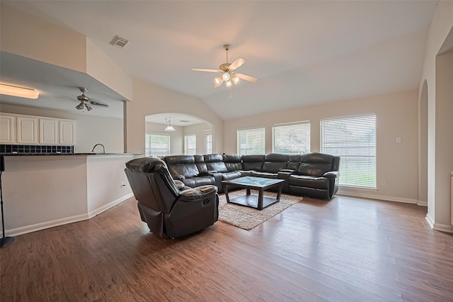 3619 Strartford Arms Ln, Sugar Land, TX 77498 - living room featuring arched walkways, ceiling fan, wood finished floors, and lofted ceiling