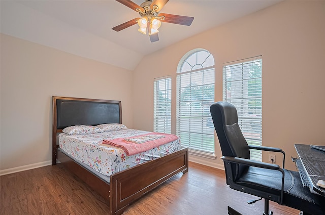 3619 Strartford Arms Ln, Sugar Land, TX 77498 - bedroom with multiple windows, a desk, light wood finished floors, lofted ceiling, and a ceiling fan