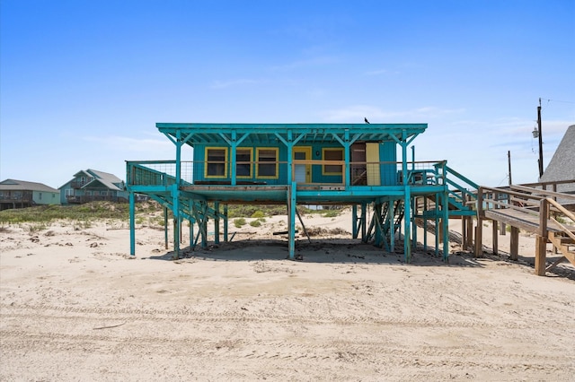 523 Blue Water Hwy, Surfside Beach, TX 77541 - view of jungle gym featuring stairway