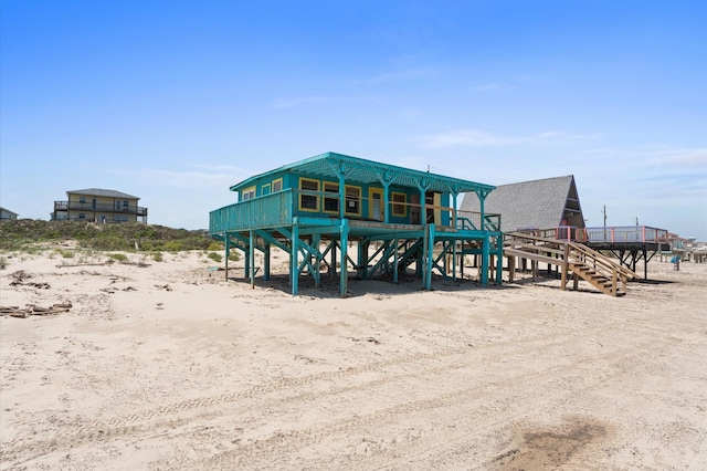 523 Blue Water Hwy, Surfside Beach, TX 77541 - view of rear view of house