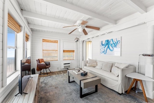 523 Blue Water Hwy, Surfside Beach, TX 77541 - living room featuring wood finished floors, a ceiling fan, wood walls, and wood ceiling with exposed beams