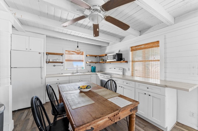 523 Blue Water Hwy, Surfside Beach, TX 77541 - dining room featuring dark wood-style flooring, wooden walls, wood ceiling with exposed beams, and a ceiling fan