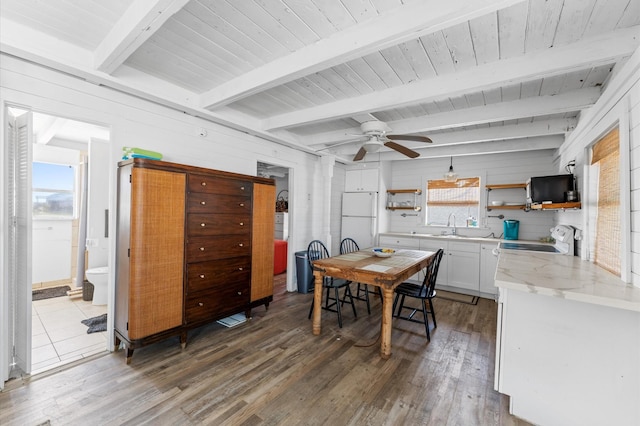 523 Blue Water Hwy, Surfside Beach, TX 77541 - dining space featuring light wood-style flooring, ceiling fan, and wood ceiling with exposed beams