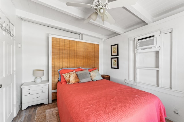 523 Blue Water Hwy, Surfside Beach, TX 77541 - bedroom featuring beam ceiling, wood finished floors, an AC wall unit, and a ceiling fan
