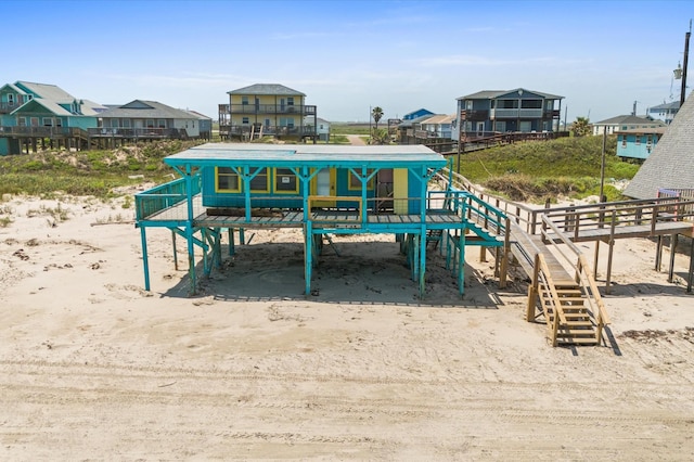 523 Blue Water Hwy, Surfside Beach, TX 77541 - view of playground with a residential view and stairs