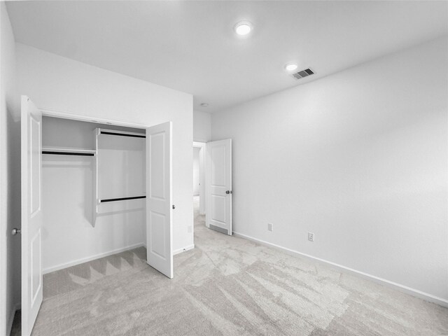 4326 Camden Springs Trl, Porter, TX 77365 - unfurnished bedroom featuring carpet flooring, a closet, baseboards, and recessed lighting
