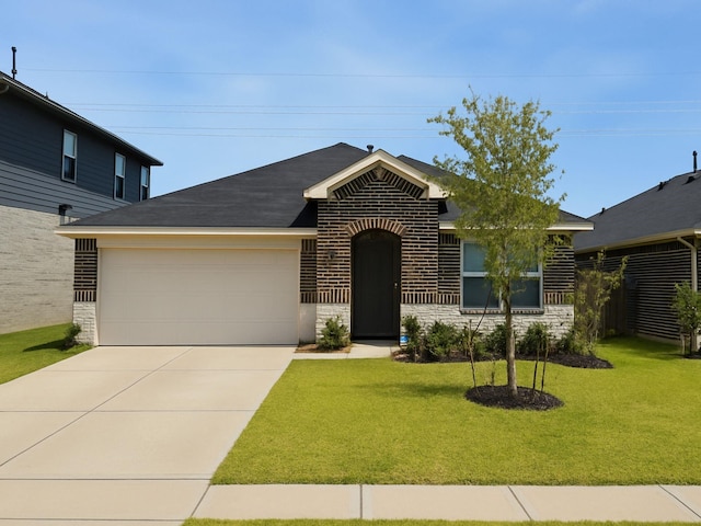 17718 Sommerset Falls Ln, Crosby, TX 77532 - view of front of house featuring an attached garage, brick siding, driveway, and a front yard