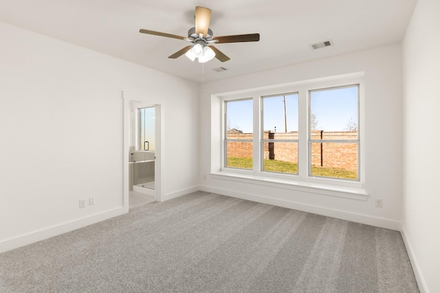 4826 Sand Clouds, Katy, TX 77493 - spare room with light colored carpet, baseboards, and ceiling fan