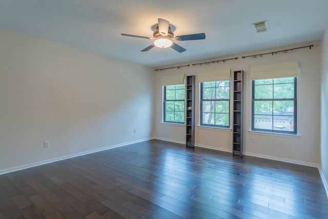 23 N Plum Crest Cir, The Woodlands, TX 77382 - spare room with ceiling fan, healthy amount of natural light, and baseboards