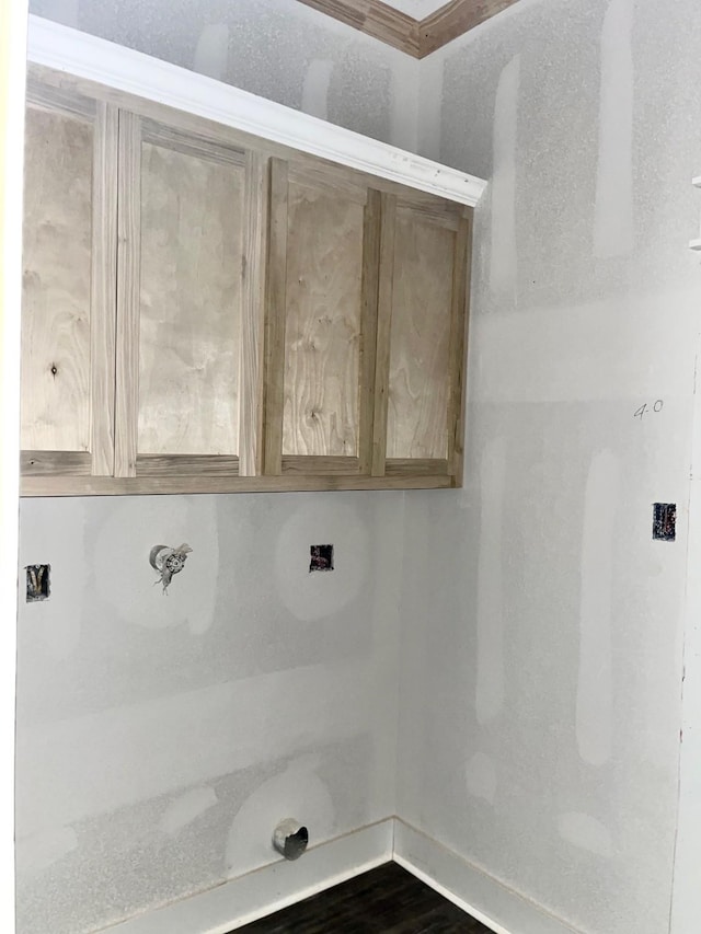 10730 Vinson St, Beaumont, TX 77713 - laundry room with baseboards and dark wood finished floors