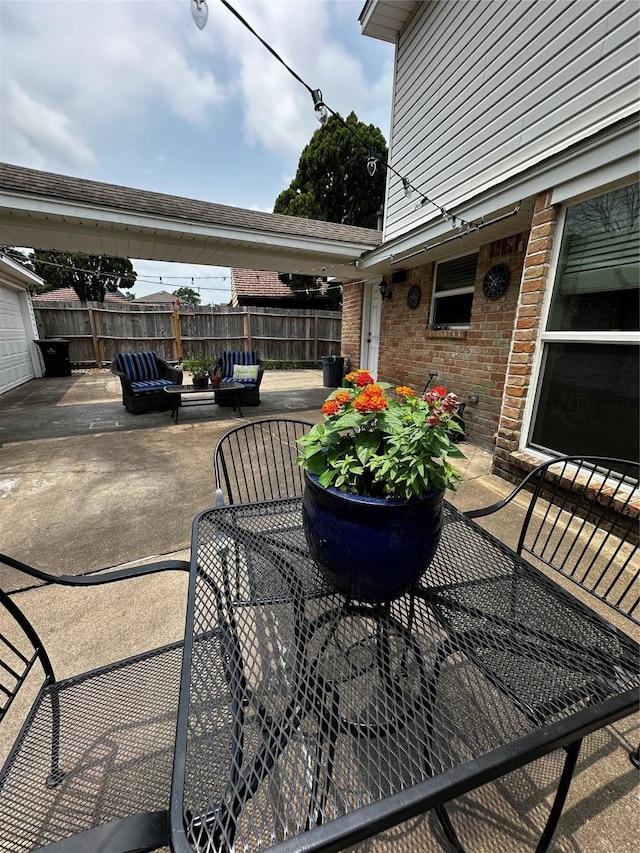 view of patio featuring an outdoor living space and outdoor dining area