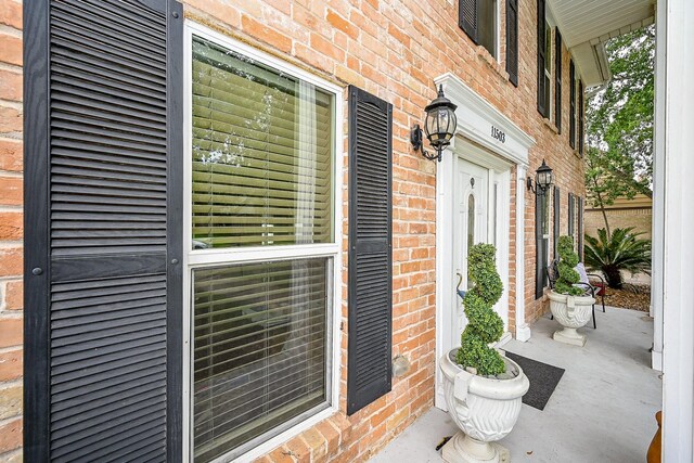 11503 Briar Rose Dr, Houston, TX 77077 - entrance to property with brick siding and covered porch