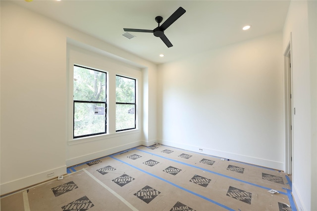 1032 W 41st St, Houston, TX 77018 - empty room with a ceiling fan, recessed lighting, and baseboards