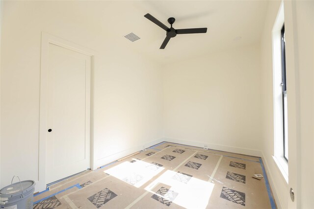 1032 W 41st St, Houston, TX 77018 - spare room with ceiling fan and baseboards