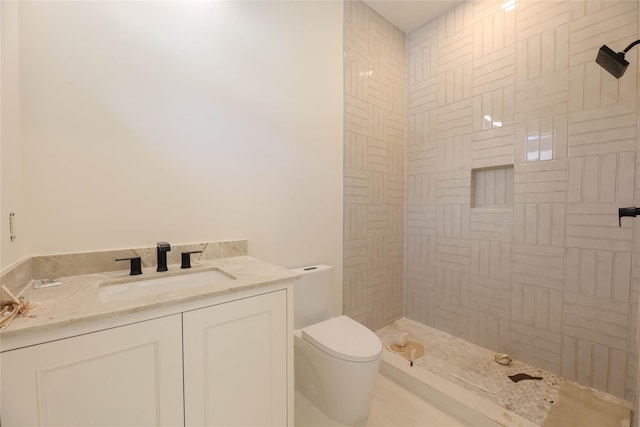 1032 W 41st St, Houston, TX 77018 - full bathroom featuring a tile shower, toilet, and vanity