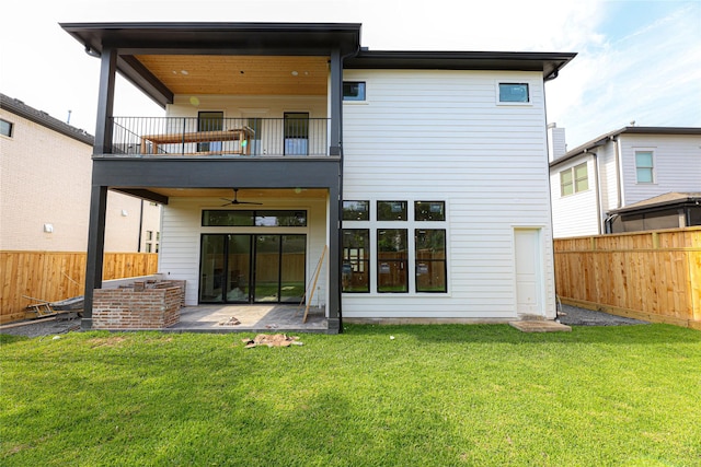 1032 W 41st St, Houston, TX 77018 - back of property featuring a balcony, ceiling fan, and a patio area