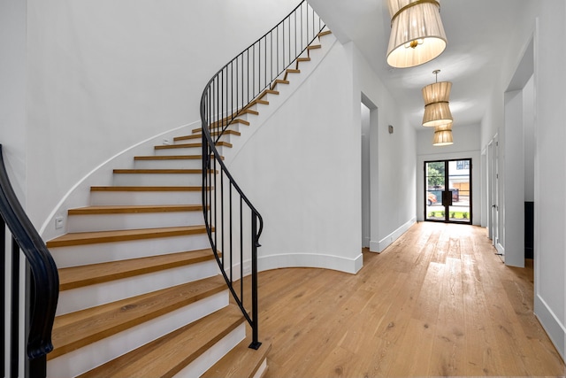 1032 W 41st St, Houston, TX 77018 - foyer entrance featuring hardwood / wood-style flooring, baseboards, and stairway