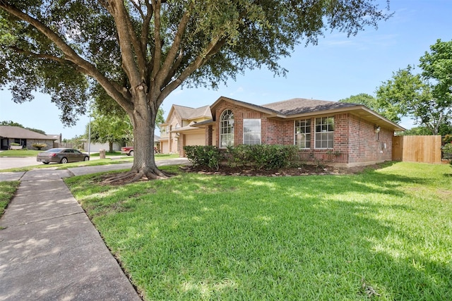 10911 Cedar Bridge St, Houston, TX 77075 - ranch-style house with brick siding, an attached garage, and driveway