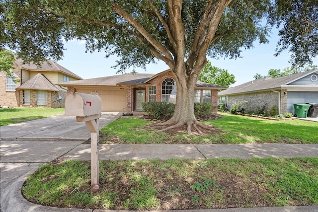 10911 Cedar Bridge St, Houston, TX 77075 - single story home with brick siding, a garage, concrete driveway, and a front yard