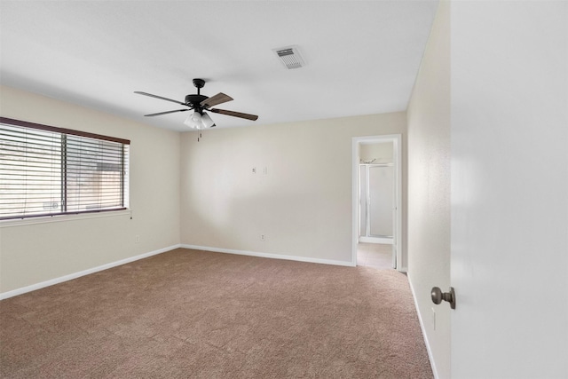 10911 Cedar Bridge St, Houston, TX 77075 - carpeted spare room featuring a ceiling fan and baseboards