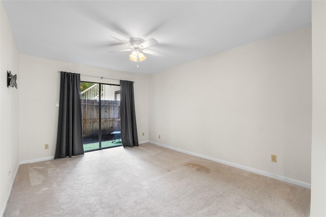 2601 S Braeswood Blvd S Unit 1403, Houston, TX 77025 - carpeted spare room featuring a ceiling fan and baseboards