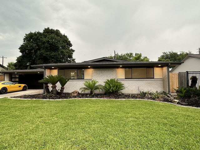 5450 Ariel St, Houston, TX 77096 - view of front of property with brick siding and an attached garage