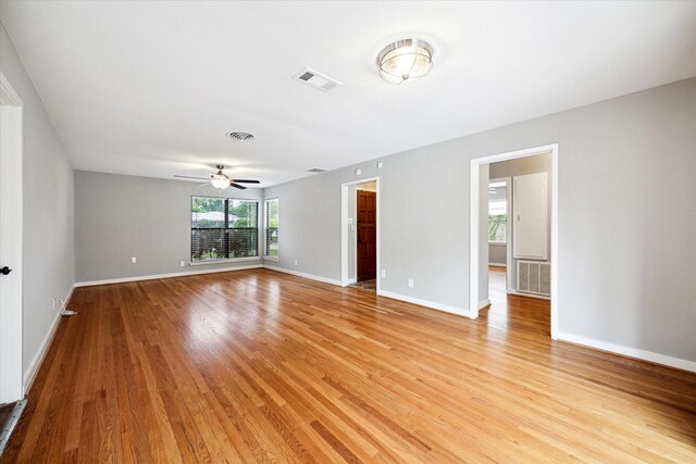 2009 Sedgie Dr, Houston, TX 77080 - spare room with a ceiling fan, light wood-style flooring, and baseboards