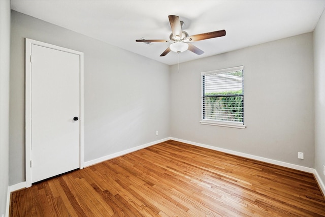 2009 Sedgie Dr, Houston, TX 77080 - empty room with wood finished floors, baseboards, and ceiling fan