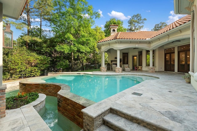 3 Maroon Creek Ct, The Woodlands, TX 77389 - swimming pool featuring a patio area