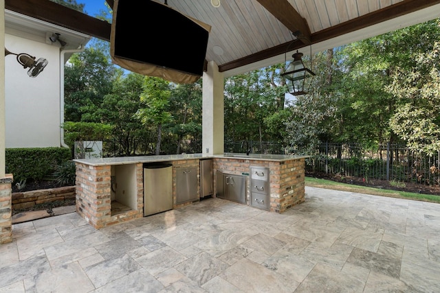 3 Maroon Creek Ct, The Woodlands, TX 77389 - view of patio / terrace with area for grilling and view of wooded area
