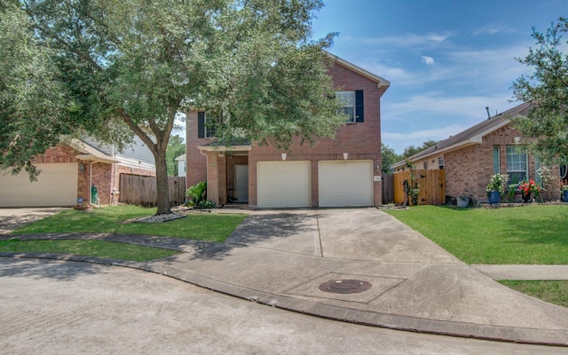 1418 High Thicket Ct, Spring, TX 77373 - view of front of house with brick siding, concrete driveway, and an attached garage