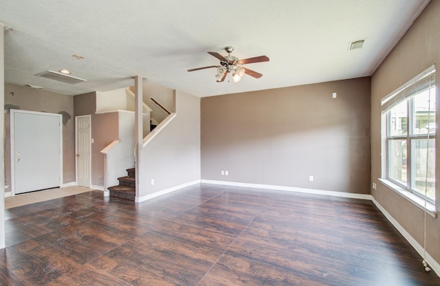 1418 High Thicket Ct, Spring, TX 77373 - unfurnished living room with wood finished floors, a ceiling fan, stairs, and baseboards
