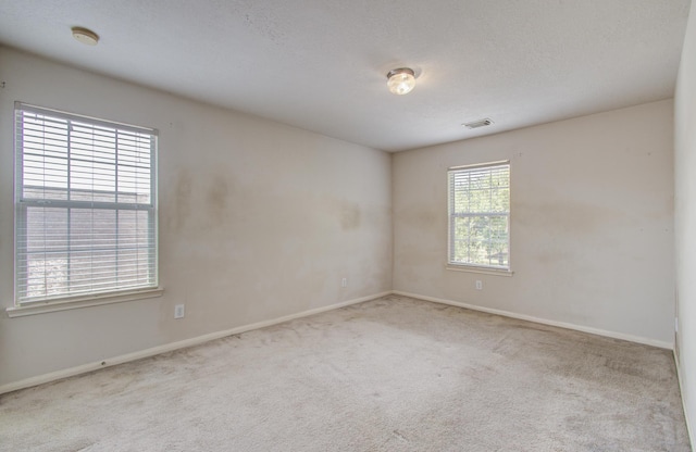 1418 High Thicket Ct, Spring, TX 77373 - spare room with carpet flooring and baseboards