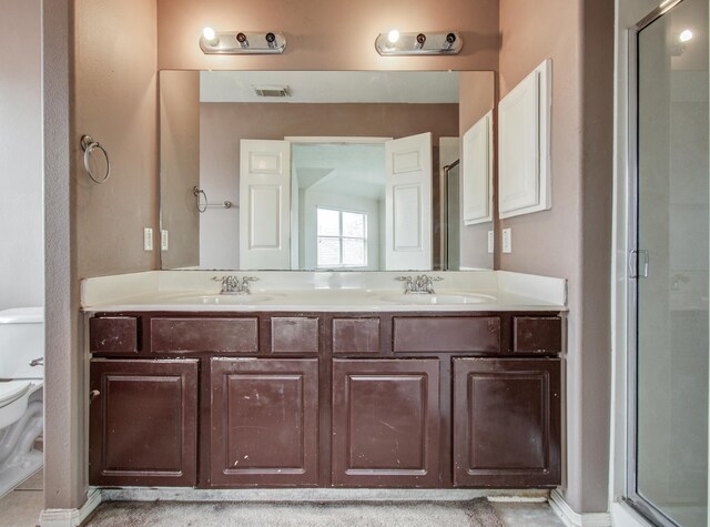1418 High Thicket Ct, Spring, TX 77373 - full bathroom featuring toilet, a stall shower, and double vanity