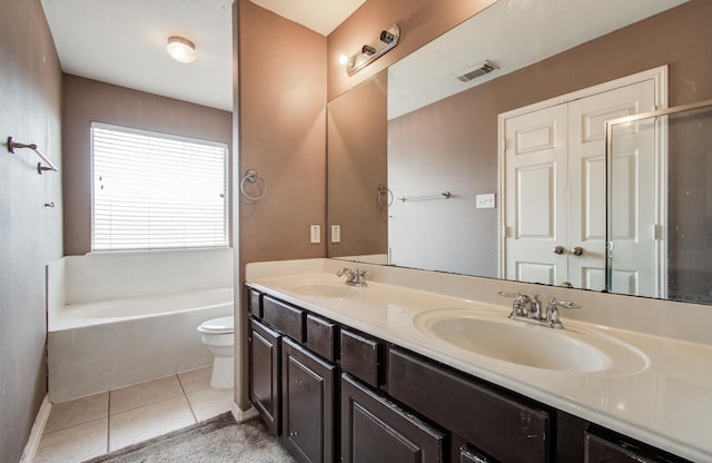1418 High Thicket Ct, Spring, TX 77373 - full bathroom featuring tile patterned flooring, double vanity, toilet, and a bath