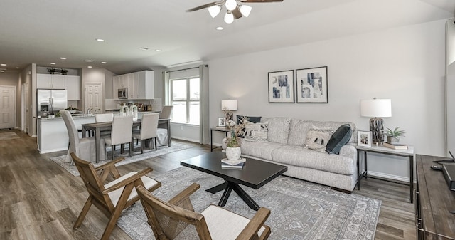 310 Bandit Cove Ct, Crosby, TX 77354 - living room featuring a ceiling fan, dark wood-style flooring, recessed lighting, and baseboards